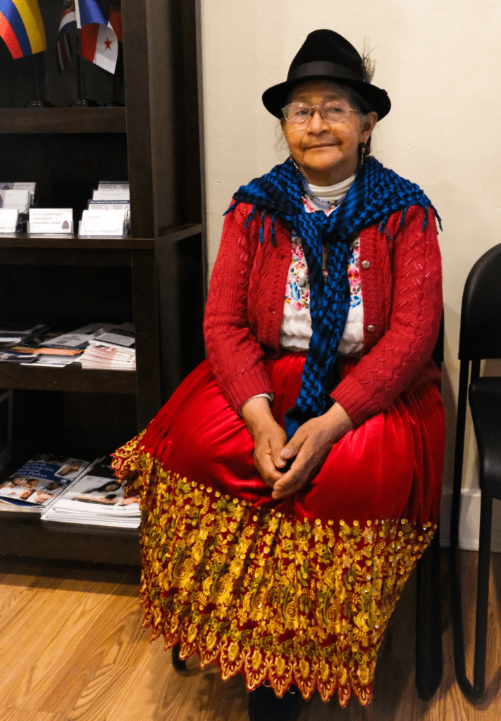 A woman from Ecuador waits patiently in the lobby of Casa San Jose.