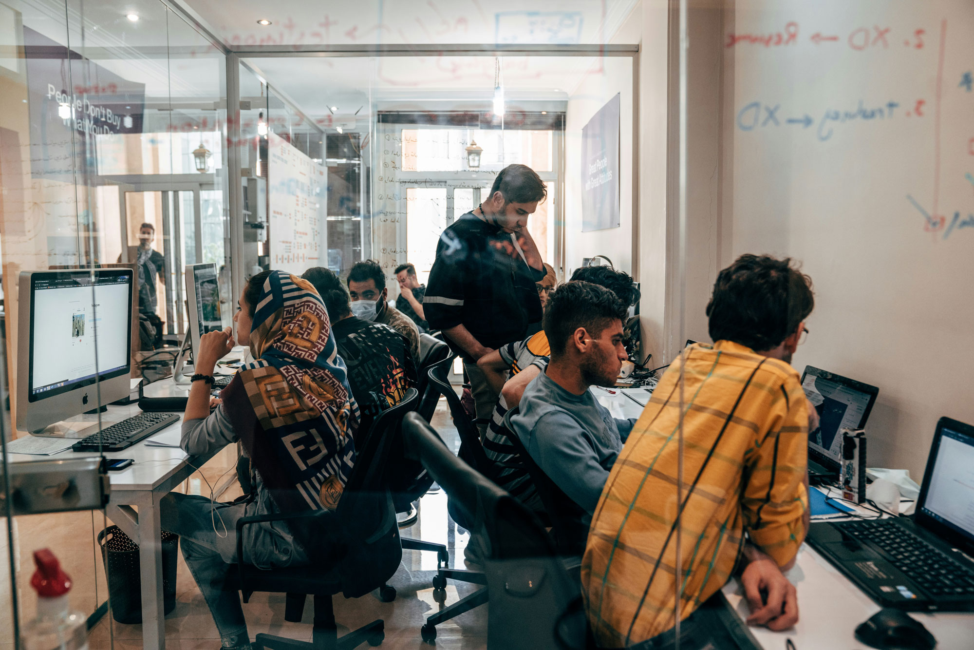 Students in a computer lab working on projects