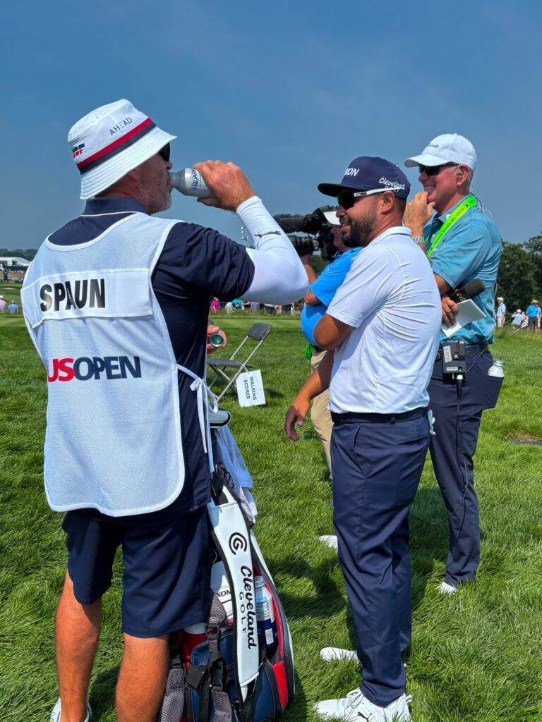 JJ Spaun and Mark Carens (Caddy) after parring hole 3 on Thursday.