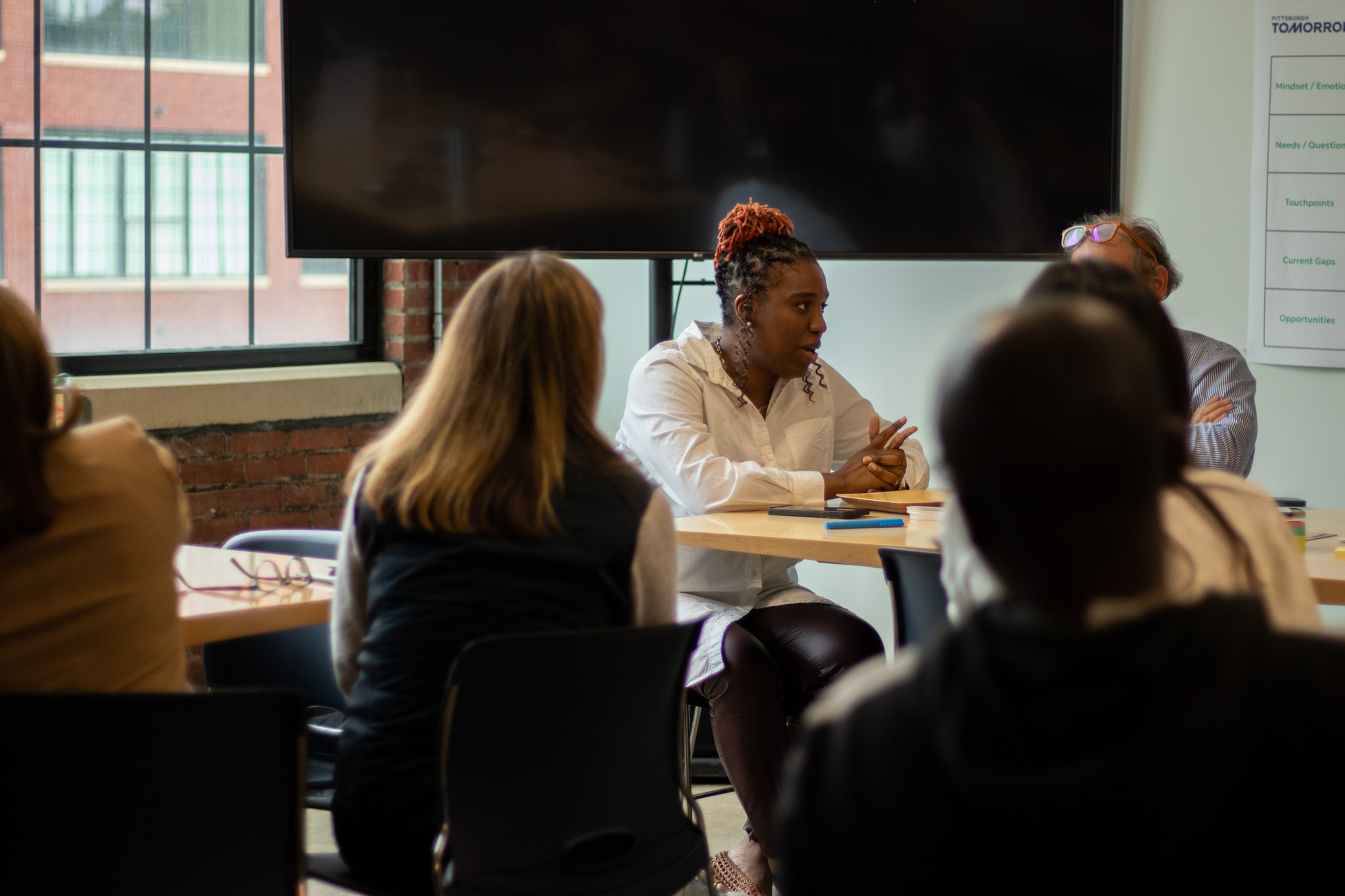 Feyi leads in a workshop